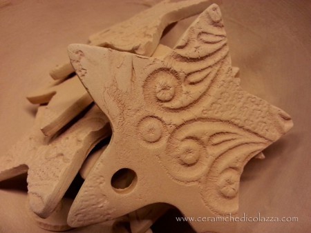 Stelle in terracotta per addobbi
